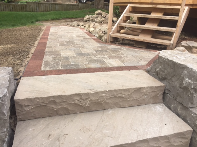 Stone steps and interlock landing